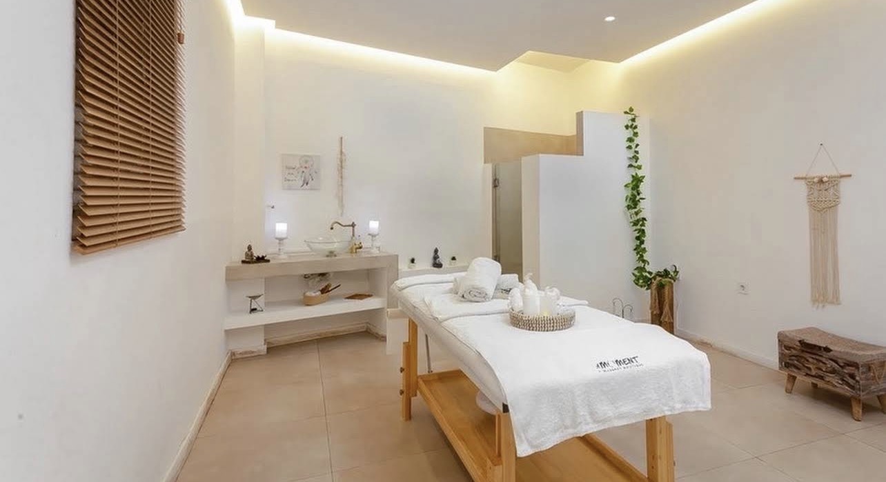 Minimal private massage treatment room in Athens